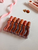 لیپ گلاس گیسو دوپ سری تافی ollibola lip oil